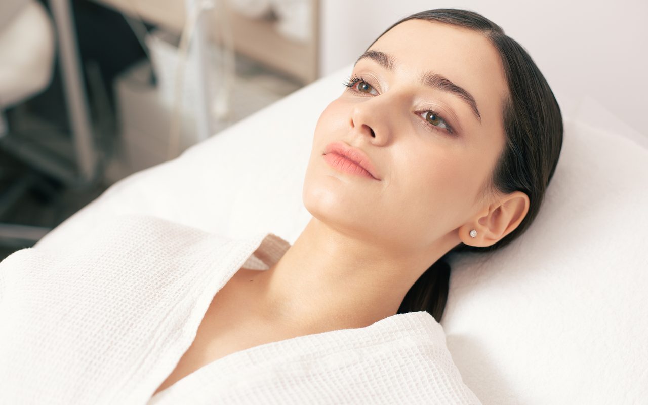 A client relaxing with luminous glass skin after a HydraGlass facial at Waldor Clinic, London